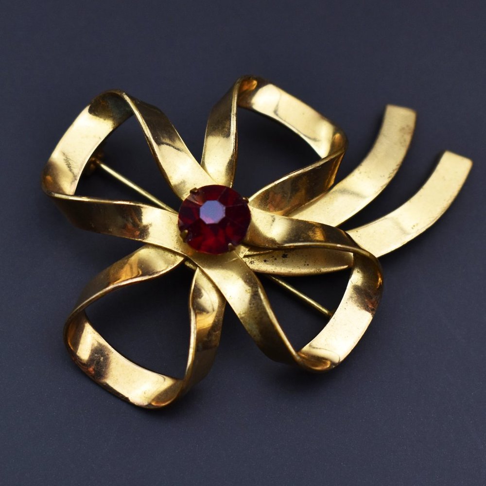 Gold bow brooch with red crystal, large fancy lapel pin